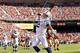 Sep 22, 2013; San Francisco, CA, USA; Indianapolis Colts quarterback Andrew Luck (12) reacts after rushing for a touchdown against the San Francisco 49ers in the fourth quarter at Candlestick Park. The Colts defeated the 49ers 27-7. Mandatory Credit: Cary