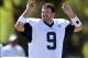 Jul 23, 2013; Oxnard, CA, USA; Dallas Cowboys quarterback Tony Romo (9) calls a play at training camp at the River Ridge Fields. Mandatory Credit: Jayne Kamin-Oncea-USA TODAY Sports.