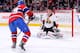 Montreal Canadiens forward Michael Bournival goes in against Ottawa Senator Craig Anderson.
