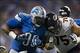 Sep 29, 2013; Detroit, MI, USA; Detroit Lions defensive tackle Nick Fairley (98) fumble recovery runs the ball in for a touch down Chicago Bears offensive guard Kyle Long (75) attempts to defend in the third quarter at Ford Field. Mandatory Credit: Rick O