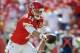 Sep 29, 2013; Kansas City, MO, USA; Kansas City Chiefs quarterback Alex Smith (11) hands off during the second half of the game against the New York Giants at Arrowhead Stadium. The Chiefs won 31-7. Mandatory Credit: Denny Medley-USA TODAY Sports