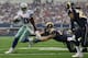 ARLINGTON, TX - SEPTEMBER 22: DeMarco Murray #29 of the Dallas Cowboys runs the ball against Chris Long #91 of the St. Louis Rams at AT&T Stadium on September 22, 2013 in Arlington, Texas. (Photo by Ronald Martinez/Getty Images)