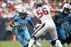 Sep 15, 2013; Houston, TX, USA; Tennessee Titans running back Chris Johnson (28) runs with the ball against Houston Texans linebacker Brian Cushing (56) at Reliant Stadium. The Houston Texans beat the Tennessee Titans 30-24 in overtime. Mandatory Credit:
