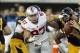 Sep 14, 2013; Berkeley, CA, USA; Ohio State Buckeyes defensive lineman Joey Bosa (97) pursues the ball against the California Golden Bears in the third quarter at Memorial Stadium. The Buckeyes defeated the Golden Bears 52-34. Mandatory Credit: Cary Edmon