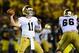 Sep 7, 2013; Ann Arbor, MI, USA; Notre Dame Fighting Irish quarterback Tommy Rees (11) throws a pass during the second quarter against the Michigan Wolverines at Michigan Stadium. Mandatory Credit: Andrew Weber-USA TODAY Sports