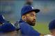 Aug 26, 2013; Los Angeles, CA, USA; Los Angeles Dodgers center fielder Matt Kemp watches from the dugout during the game against the Chicago Cubs at Dodger Stadium. The Dodgers defeated the Cubs 6-2. Mandatory Credit: Kirby Lee-USA TODAY Sports