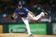 ARLINGTON, TX - SEPTEMBER 25: Martin Perez #33 of the Texas Rangers pitches in the second inning against the Houston Astros at Rangers Ballpark in Arlington on September 25, 2013 in Arlington, Texas. (Photo by Rick Yeatts/Getty Images)