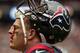 HOUSTON, TX - SEPTEMBER 29: J.J. Watt #99 of the Houston Texans comes off the field after suffering a cut to the bridge of his nose against the Seattle Seahawks at Reliant Stadium on September 29, 2013 in Houston, Texas. (Photo by Bob Levey/Getty Images