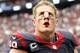 HOUSTON, TX- SEPTEMBER 29: J.J. Watt #99 of the Houston Texans leaves the field after losing to the Houston Texans on September 29, 2013 at Reliant Stadium in Houston, Texas. (Photo by Thomas B. Shea/Getty Images)