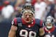 HOUSTON, TX - SEPTEMBER 29: J.J. Watt #99 of the Houston Texans comes off the field after suffering a cut to the bridge of his nose against the Seattle Seahawks at Reliant Stadium on September 29, 2013 in Houston, Texas. (Photo by Bob Levey/Getty Images