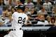 Sep 4, 2013; Bronx, NY, USA; New York Yankees second baseman Robinson Cano (24) singles to right during the seventh inning against the Chicago White Sox at Yankee Stadium. Yankees won 6-5. Mandatory Credit: Anthony Gruppuso-USA TODAY Sports