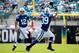 JACKSONVILLE, FL - SEPTEMBER 29: Andrew Luck #12 of the Indianapolis Colts attempts a pass to Stanley Havili #39 during the game against the Jacksonville Jaguars at EverBank Field on September 29, 2013 in Jacksonville, Florida. (Photo by Sam Greenwood