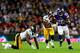 LONDON, ENGLAND - SEPTEMBER 29: Running back Adrian Peterson #28 of the Minnesota Vikings beats cornerback Cortez Allen #28 of the Pittsburgh Steelers and inside linebacker Lawrence Timmons #94 of the Pittsburgh Steelers during the NFL International Seri