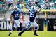 JACKSONVILLE, FL - SEPTEMBER 29: Andrew Luck #12 of the Indianapolis Colts attempts a pass to Stanley Havili #39 during the game against the Jacksonville Jaguars at EverBank Field on September 29, 2013 in Jacksonville, Florida. (Photo by Sam Greenwood
