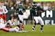 PHILADELPHIA, PA - SEPTEMBER 19: Michael Vick #7 of the Philadelphia Eagles runs for a first down in the first quarter against the Kansas City Chiefs at Lincoln Financial Field on September 19, 2013 in Philadelphia, Pennsylvania. (Photo by Elsa/Getty Im