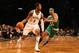 Nov 15 2012; New York, NY, USA; Brooklyn Nets point guard MarShon Brooks (9) moves past Boston Celtics shooting guard Courtney Lee (11) during the third quarter at Barclays Center. Brooklyn won 102-97. Mandatory Credit: Anthony Gruppuso-USA TODAY Sports