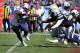 NASHVILLE, TN - SEPTEMBER 22: Running back Chris Johnson #28 of the Tennessee Titans rushes against the San Diego Chargers at LP Field on September 22, 2013 in Nashville, Tennessee. (Photo by Frederick Breedon/Getty Images)
