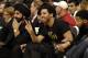 TORONTO, CANADA - NOVEMBER 30: Recording artist Drake looks on during the game against the Phoenix Suns and Toronto Raptors on November 30, 2012 at the Air Canada Centre in Toronto, Ontario, Canada. NOTE TO USER: User expressly acknowledges and agrees th