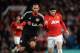 MANCHESTER, ENGLAND - SEPTEMBER 17: Wayne Rooney of Manchester United competes with Omer Toprak of Bayer Leverkusen during the UEFA Champions League Group A match between Manchester United and Bayer Leverkusen at Old Trafford on September 17, 2013 in Man