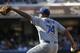 SAN DIEGO, CA - SEPTEMBER 22: Kenley Jansen #74 of the Los Angeles Dodgers pitches during the ninth inning of a baseball game against the San Diego Padres at Petco Park on September 22, 2013 in San Diego, California. (Photo by Denis Poroy/Getty Images