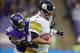 Sep 29, 2013; London, UNITED KINGDOM; Pittsburgh Steelers quarterback Ben Roethlisberger (7) is pressured by Minnesota Vikings linebacker Erin Henderson (50) in the NFL International Series game at Wembley Stadium. Mandatory Credit: Kirby Lee-USA TODAY Sp