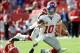 Sep 29, 2013; Kansas City, MO, USA; New York Giants quarterback Eli Manning (10) is sacked by Kansas City Chiefs defensive end Allen Bailey (97) during the second half at Arrowhead Stadium. The Chiefs won 31-7. Mandatory Credit: Denny Medley-USA TODAY Spo