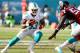 MIAMI GARDENS, FL - SEPTEMBER 22:Running back Daniel Thomas #33 of the Miami Dolphins runs the ball against the Atlanta Falcons at Sun Life Stadium on September 22, 2013 in Miami Gardens, Florida. The Dolphins defeated the Falcons 27-23. (Photo by Marc S
