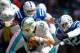 INDIANAPOLIS, IN - SEPTEMBER 15: Pat Angerer #51 and Bjoern Werner #92 of the Indianapolis Colts converge for the sack on Ryan Tannehill #17 of the Miami Dolphins at Lucas Oil Stadium on September 15, 2013 in Indianapolis, Indiana. (Photo by Michael Hicke