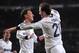 MADRID, SPAIN - MARCH 16: Gonzalo Higuain (R) of Real Madrid CF celebrates with Mesut Ozil after scoring Real's 4th goal during the La Liga match between Real Madrid CF and RCD Mallorca at estadio Santiago Bernabeu on March 16, 2013 in Madrid, Spain. (P