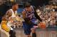 INDIANAPOLIS, IN - MAY 14: Carmelo Anthony #7 of the New York Knicks controls the ball against Paul George #24 of the Indiana Pacers in Game Four of the Eastern Conference Semi-finals during the NBA Playoffs on May 14, 2013 at Bankers Life Fieldhouse in I
