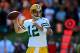 Sep 22, 2013; Cincinnati, OH, USA; Green Bay Packers quarterback Aaron Rodgers (12) looks to throw a pass during the fourth quarter against the Cincinnati Bengals at Paul Brown Stadium. Mandatory Credit: Andrew Weber-USA TODAY Sports
