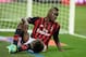 MILAN, ITALY - SEPTEMBER 22: Mario Balotelli of AC Milan appears dejected during the Serie A match between AC Milan and SSC Napoli at San Siro Stadium on September 22, 2013 in Milan, Italy. (Photo by Claudio Villa/Getty Images)