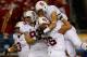 SEATTLE, WA - SEPTEMBER 28: Wide receiver Devon Cajuste #89 (top with ball) of the Stanford Cardinal celebrates with teammates after scoring a touchdown in the first quarter against the Washington State Cougars on September 28, 2013 at CenturyLink Field