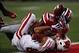 Sep 28, 2013; Columbus, OH, USA; Ohio State Buckeyes defensive back Tyvis Powell (23) knocks the ball away from Wisconsin Badgers wide receiver Alex Erickson (86) during the fourth quarter at Ohio Stadium. Buckeyes beat the Badgers 31-24. Mandatory Credit