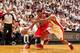 MIAMI, FL - MAY 15: Jimmy Butler #21 of the Chicago Bulls drives against LeBron James #6 of the Miami Heat in Game Five of the Eastern Conference Semifinals during the 2013 NBA Playoffs on May 15, 2013 at American Airlines Arena in Miami, Florida. NOTE TO