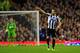 LIVERPOOL, ENGLAND - SEPTEMBER 30: Newcastle player Yohan Cabaye (r) celebrates by pointing at the Newcastle bench after scoring the first goal during the Barclays Premier League match between Everton and Newcastle United at Goodison Park on September 30