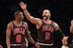 NEW YORK, NY - APRIL 04: Luol Deng #9 and Carlos Boozer #5 of the Chicago Bulls play against the Brooklyn Nets at the Barclays Center on April 4, 2013 in New York City. NOTE TO USER: User expressly acknowledges and agrees that, by downloading and/or using