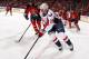 SUNRISE, FL - APRIL 6: Jason Chimera #25 of the Washington Capitals skates with the puck against Tyson Strachan #23 of the Florida Panthers at the BB&T Center on April 6, 2013 in Sunrise, Florida. (Photo by Eliot J. Schechter/NHLI via Getty Images)