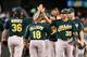 SEATTLE, WA - SEPTEMBER 29: Members of the Oakland Athletics celebrate after defeating the Seattle Mariners 9-0 at Safeco Field on September 29, 2013 in Seattle, Washington. (Photo by Otto Greule Jr/Getty Images)