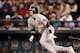 Sep 27, 2013; Seattle, WA, USA; Oakland Athletics third baseman Josh Donaldson (20) hits an RBI-fielder's choice against the Seattle Mariners during the seventh inning at Safeco Field. Mandatory Credit: Joe Nicholson-USA TODAY Sports