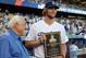 Sep 28, 2013; Los Angeles, CA, USA; Los Angeles Dodgers Tommy Lasorda presents the Roy Campanella award to pitcher Clayton Kershaw (22) before the game against the Colorado Rockies at Dodger Stadium. Mandatory Credit: Jayne Kamin-Oncea-USA TODAY Sports