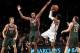Feb 19, 2013; Brooklyn, NY, USA; Brooklyn Nets guard MarShon Brooks (9) works the ball between Milwaukee Bucks forward Mike Dunleavy (17) and Milwaukee Bucks forward John Henson (31) and Milwaukee Bucks guard Beno Udrih (19) during the second quarter of a