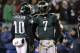 PHILADELPHIA, PA - DECEMBER 02: Quarterback Michael Vick #7 and DeSean Jackson #10 of the Philadelphia Eagles talk on the field against the Houston Texans at Lincoln Financial Field on December 2, 2010 in Philadelphia, Pennsylvania. (Photo by Jim McIsaa
