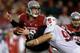 SEATTLE, WA - SEPTEMBER 28: Quarterback Connor Halliday #12 of the Washington State Cougars is tackled by Josh Mauro #90 of the Stanford Cardinal on September 28, 2013 at CenturyLink Field in Seattle, Washington. (Photo by Otto Greule Jr/Getty Images)