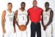 METAIRIE, LA - SEPTEMBER 30: Eric Gordon #10, Tyreke Evans #1, Head Coach Monty Williams and Jrue Holiday #11 of The New Orleans Pelicans pose for photos during NBA Media Day on September 30, 2013 at the New Orleans Pelicans practice facility in Metairie,