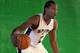 Sep 30, 2013; San Antonio, TX, USA; San Antonio Spurs forward Kawhi Leonard (2) dribbles in front of a green screen during media day at Spurs Practice Facility. Mandatory Credit: Soobum Im-USA TODAY Sports