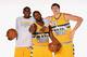 DENVER, CO - SEPTEMBER 30: (L/R) Quincy Miller #30, Jordan Hamilton #1 and Timofey Mozgov #25 of the Denver Nuggets pose for a photo on Media Day on September 30, 2013 at the Pepsi Center in Denver, Colorado. NOTE TO USER: User expressly acknowledges and