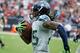 HOUSTON, TX - SEPTEMBER 29: Richard Sherman #25 of the Seattle Seahawks returns an interception 58 yaerds for a touchdown in the second half against the Houston Texans at Reliant Stadium on September 29, 2013 in Houston, Texas. (Photo by Scott Halleran
