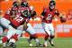 Sep 22, 2013; Miami Gardens, FL, USA; Atlanta Falcons quarterback Matt Ryan (2) hands the ball off to running back Jacquizz Rodgers (32) during the second quarter against the Miami Dolphins at Sun Life Stadium. Mandatory Credit: Steve Mitchell-USA TODAY