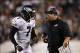 Aug 15, 2013; Philadelphia, PA, USA; Philadelphia Eagles head coach Chip Kelly talks with quarterback Michael Vick (7) during the second quarter against the Carolina Panthers at Lincoln Financial Field. Mandatory Credit: Howard Smith-USA TODAY Sports